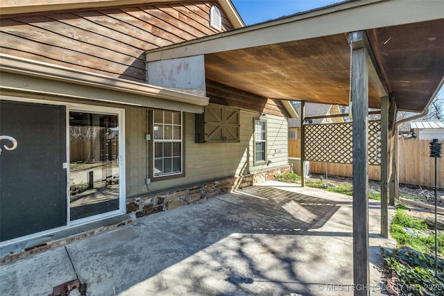 view of patio with fence