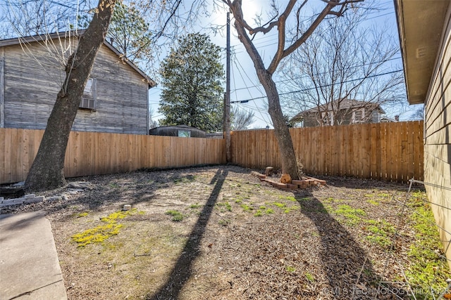 view of yard featuring a fenced backyard