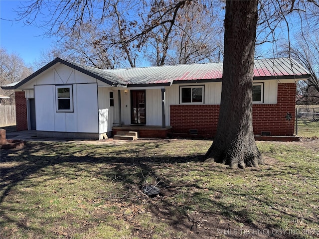 ranch-style home with crawl space, brick siding, and fence