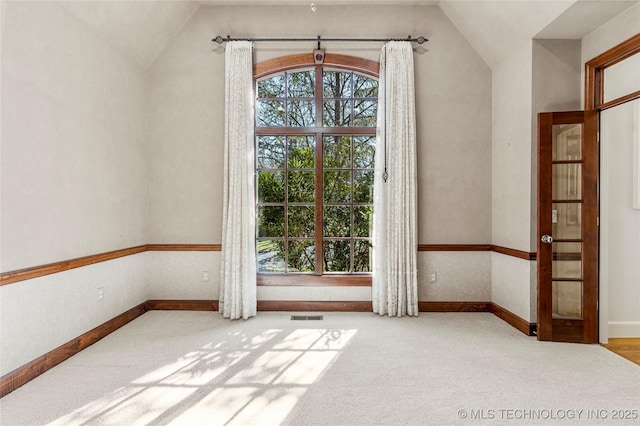 11630 S Fulton Ave, Tulsa, OK 74137 - carpeted empty room with lofted ceiling and baseboards