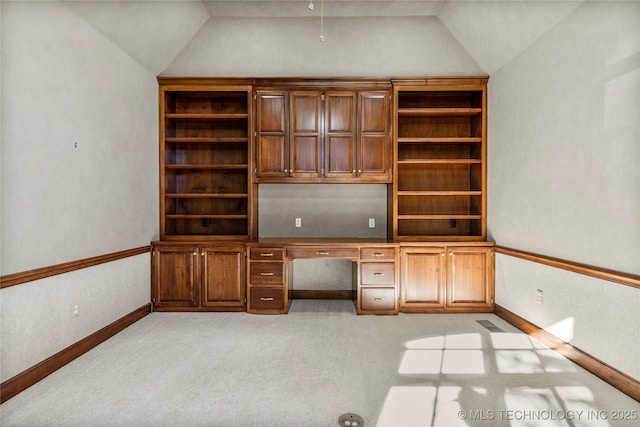 11630 S Fulton Ave, Tulsa, OK 74137 - unfurnished office with lofted ceiling, built in desk, baseboards, and light carpet