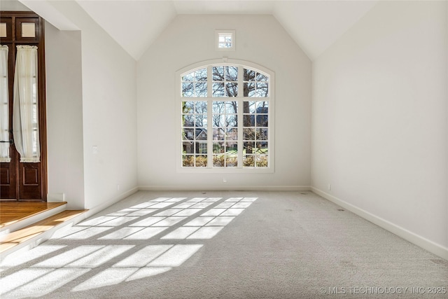 11630 S Fulton Ave, Tulsa, OK 74137 - spare room featuring carpet floors, vaulted ceiling, and baseboards
