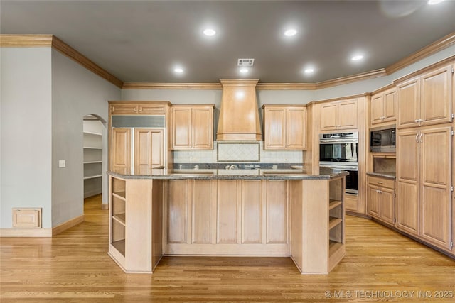 11630 S Fulton Ave, Tulsa, OK 74137 - kitchen with open shelves, built in appliances, ornamental molding, light brown cabinets, and premium range hood