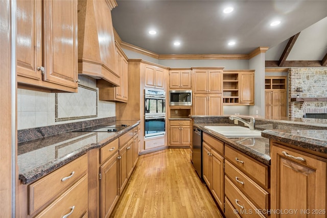 11630 S Fulton Ave, Tulsa, OK 74137 - kitchen with premium range hood, open shelves, a sink, light wood-style floors, and appliances with stainless steel finishes