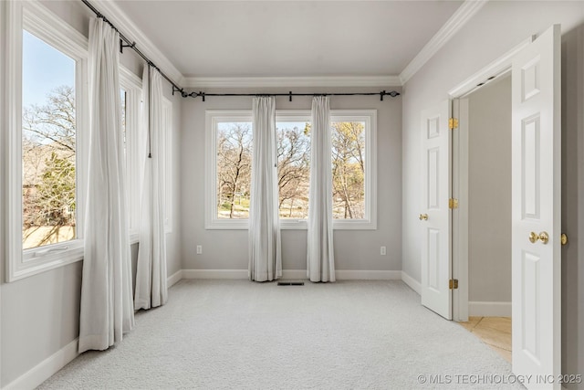 11630 S Fulton Ave, Tulsa, OK 74137 - unfurnished bedroom with light colored carpet, ornamental molding, and baseboards