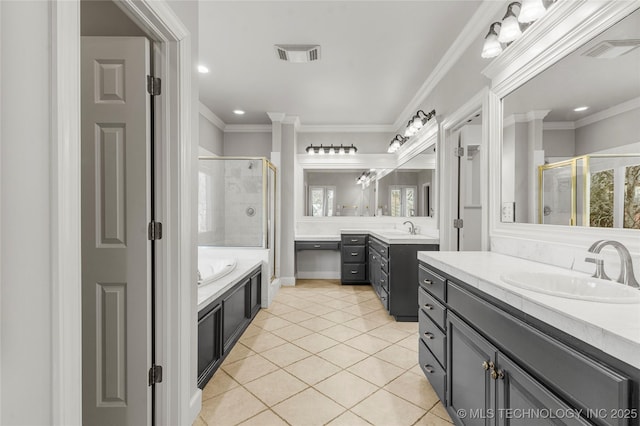 11630 S Fulton Ave, Tulsa, OK 74137 - bathroom featuring a shower stall, two vanities, tile patterned floors, a garden tub, and crown molding