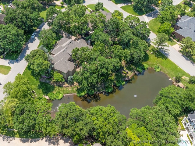11630 S Fulton Ave, Tulsa, OK 74137 - aerial perspective of suburban area featuring a large body of water and a tree filled landscape