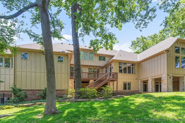 11630 S Fulton Ave, Tulsa, OK 74137 - rear view of house with board and batten siding, stairs, a yard, roof with shingles, and a deck