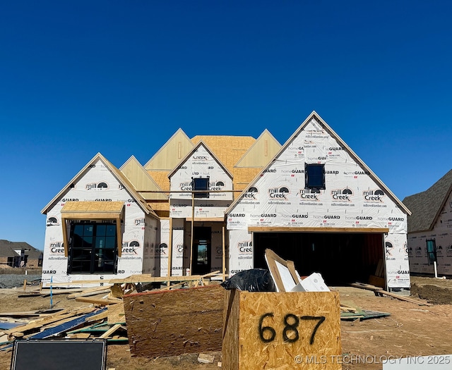 property under construction with a garage