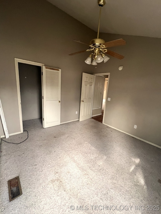 spare room featuring a ceiling fan, baseboards, visible vents, and carpet flooring