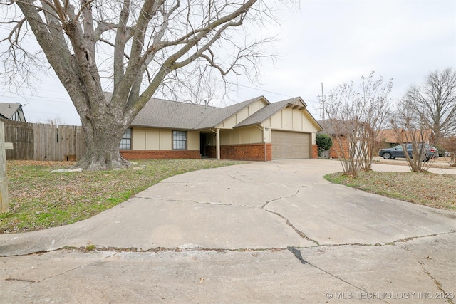 ranch-style house featuring brick siding, concrete driveway, board and batten siding, fence, and a garage