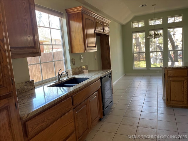 kitchen with a wealth of natural light, dishwasher, a sink, and light tile patterned floors