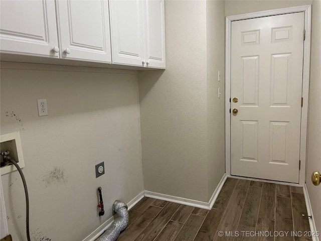 laundry area with dark wood-type flooring, washer hookup, baseboards, cabinet space, and electric dryer hookup