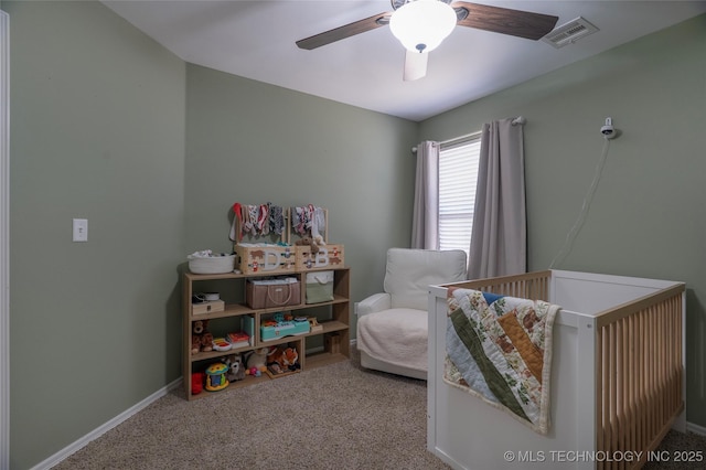 11923 E 105th Ct N, Owasso, OK 74055 - carpeted bedroom featuring a crib and a ceiling fan