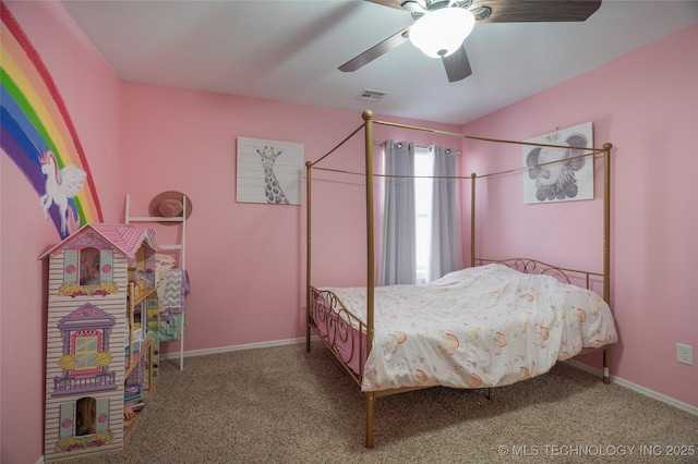 carpeted bedroom with visible vents, baseboards, and ceiling fan