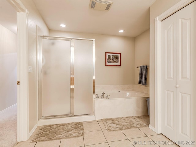 bathroom with a stall shower, visible vents, a garden tub, tile patterned flooring, and recessed lighting