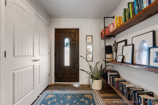 foyer entrance featuring wood finished floors