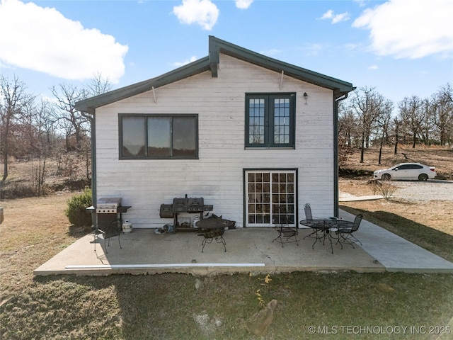 back of house featuring a patio area