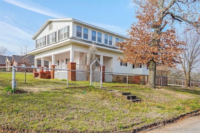 view of home's exterior with covered porch, a yard, and fence