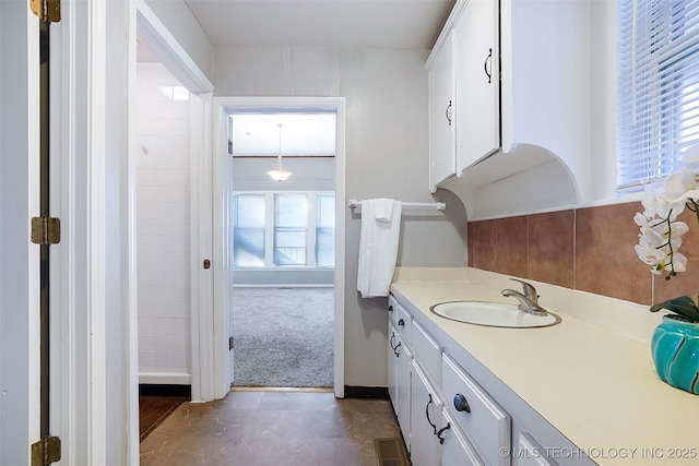 bathroom featuring visible vents and vanity