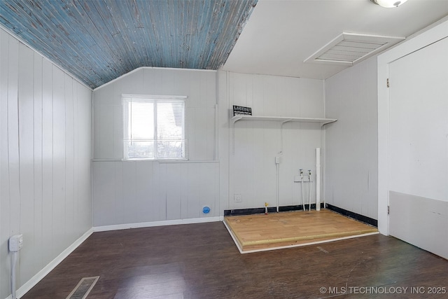 interior space featuring wood ceiling, visible vents, vaulted ceiling, and wood finished floors