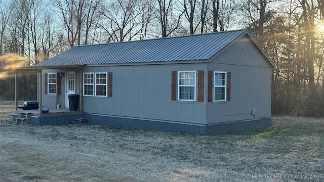 view of front of house featuring metal roof