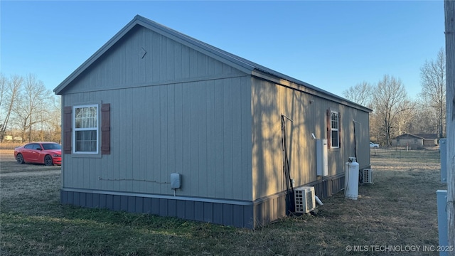 view of property exterior with central AC unit