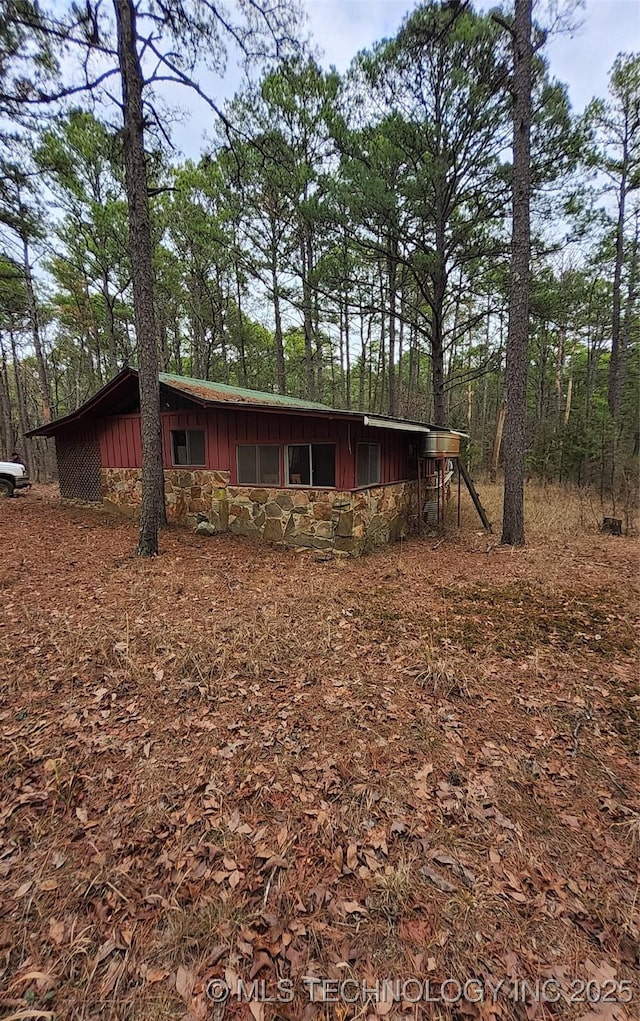 view of side of property featuring board and batten siding