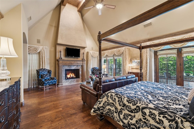 bedroom with access to exterior, visible vents, dark wood-type flooring, a high end fireplace, and beamed ceiling