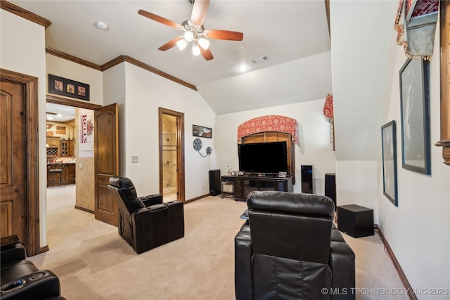 living room featuring light carpet, baseboards, visible vents, ceiling fan, and vaulted ceiling