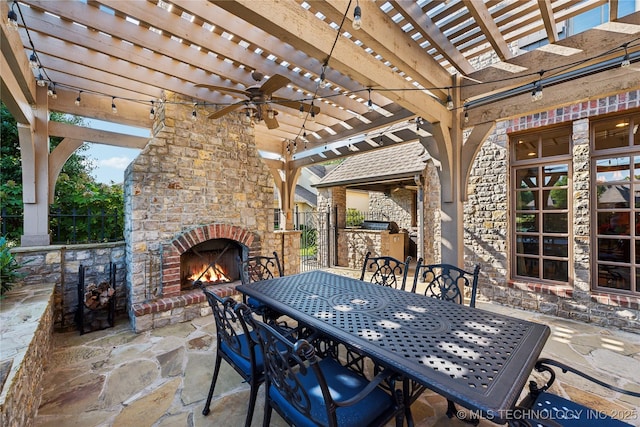 view of patio / terrace featuring an outdoor brick fireplace, a ceiling fan, outdoor dining area, exterior kitchen, and a pergola