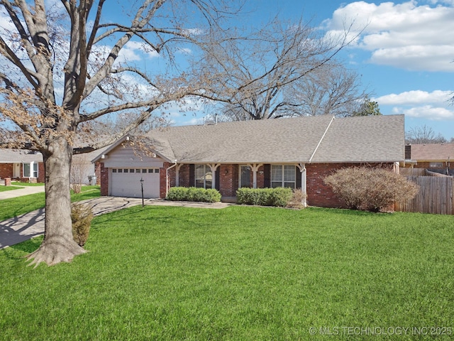 ranch-style house featuring a front yard, a garage, brick siding, and concrete driveway