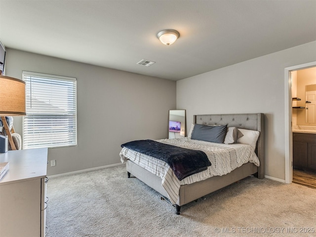 bedroom featuring light carpet, visible vents, and baseboards