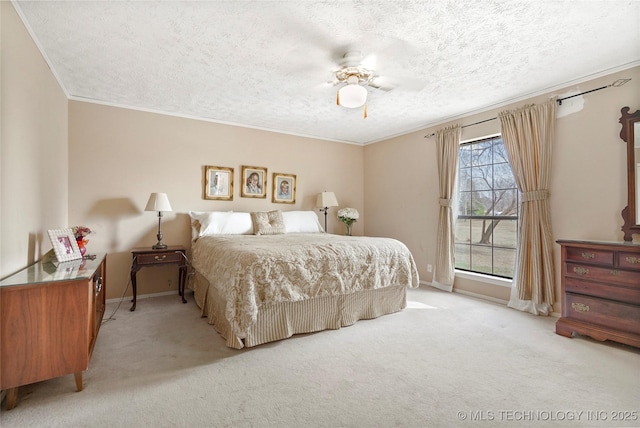 bedroom featuring ornamental molding, light colored carpet, and a textured ceiling