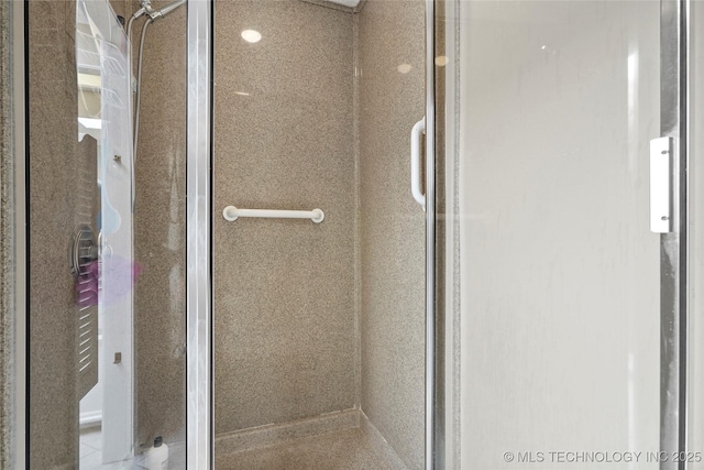 full bathroom with a shower stall