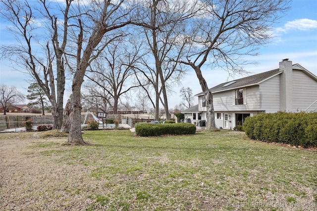 view of yard with fence