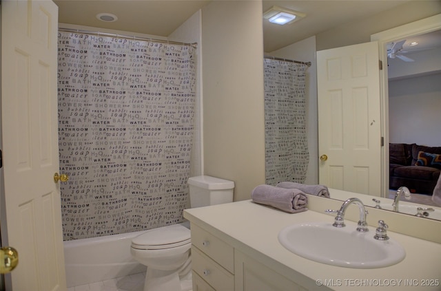 full bathroom with shower / bath combo with shower curtain, toilet, vanity, and a ceiling fan