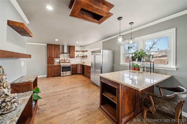 kitchen featuring crown molding, open shelves, appliances with stainless steel finishes, a sink, and wall chimney range hood