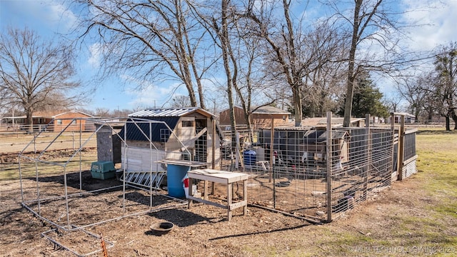 view of yard with an outbuilding and exterior structure