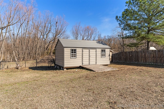 view of shed featuring a fenced backyard