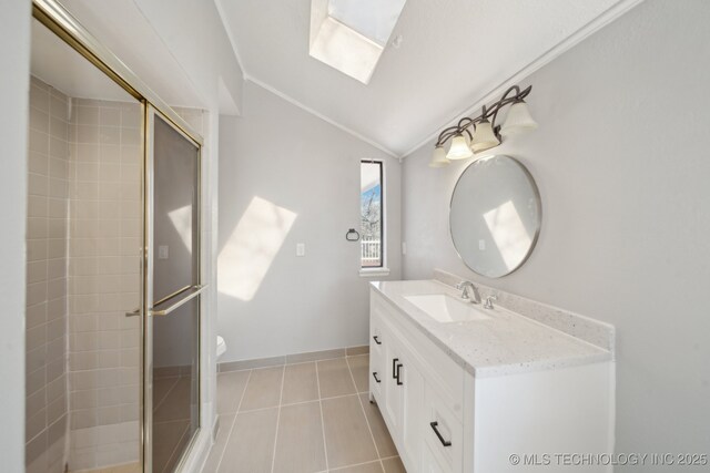 9435 S 33rd W Ave, Tulsa, OK 74132 - full bathroom with vaulted ceiling, vanity, a stall shower, ornamental molding, and toilet