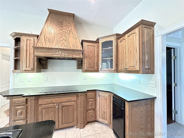 kitchen featuring lofted ceiling, light tile patterned flooring, open shelves, stovetop, and glass insert cabinets