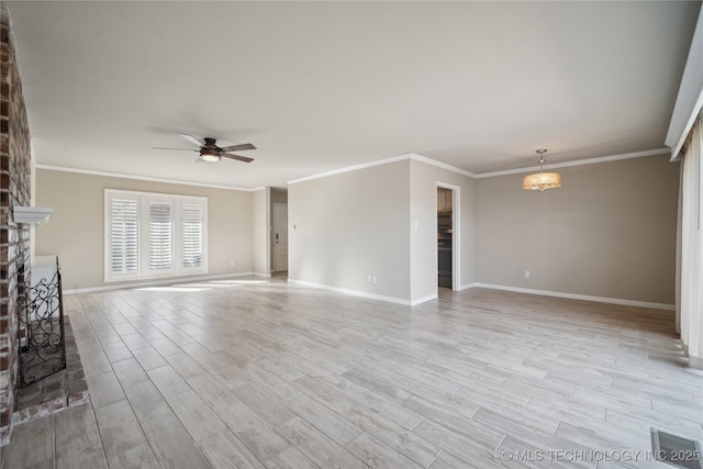 unfurnished living room featuring light wood-style flooring, a fireplace, ceiling fan with notable chandelier, and baseboards