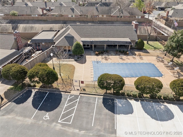 birds eye view of property with a residential view
