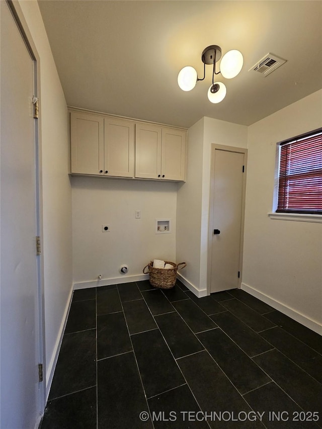 washroom with visible vents, gas dryer hookup, washer hookup, cabinet space, and hookup for an electric dryer