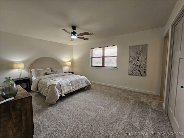 bedroom with carpet, baseboards, and ceiling fan