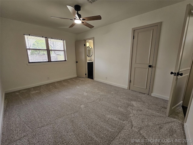 unfurnished bedroom with visible vents, ceiling fan, baseboards, carpet floors, and ensuite bathroom