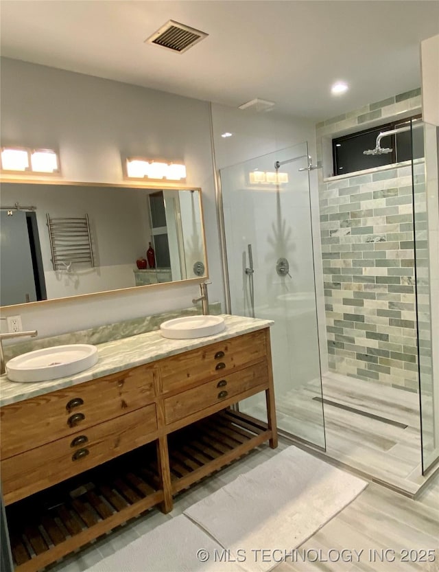 4101 Rolling Hls, Ardmore, OK 73401 - full bathroom with a shower stall, visible vents, and a sink