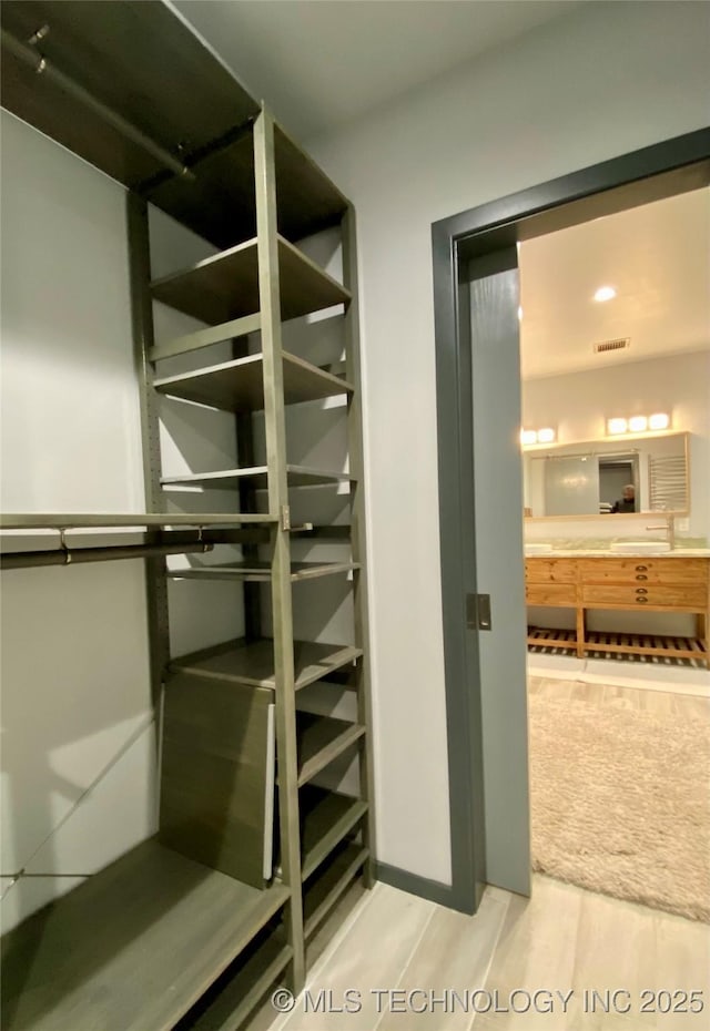 4101 Rolling Hls, Ardmore, OK 73401 - spacious closet with visible vents and light wood-style flooring
