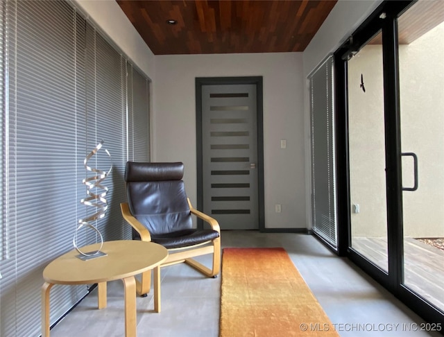 interior space featuring wooden ceiling